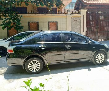 Toyota Vios 2014 - Chính chủ cần bán chiếc Toyota Vios 1.5E 2014, màu đen, giá cực rẻ