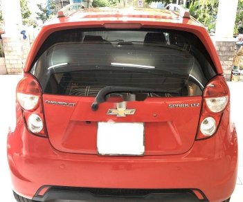 Chevrolet Spark 2015 - Cần bán gấp Chevrolet Spark đời 2015, màu đỏ số tự động