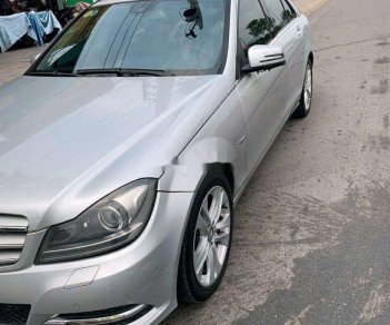 Mercedes-Benz C class 2012 - Cần bán lại xe Mercedes sản xuất 2012, màu bạc đã đi 110.000km