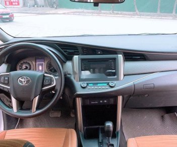 Toyota Innova 2016 - Cần bán lại xe Toyota Innova 2.0G AT đời 2016, màu bạc số tự động, 635 triệu