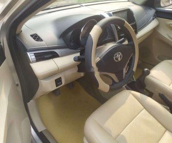 Toyota Vios 2014 - Cần bán lại xe Toyota Vios đời 2014, màu vàng cát, giá chỉ 310 triệu