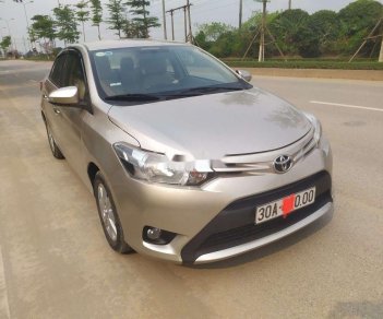 Toyota Vios 2014 - Cần bán lại xe Toyota Vios đời 2014, màu vàng cát, giá chỉ 310 triệu