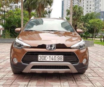 Hyundai i20 Active  1.4 AT 2015 - Cần bán gấp Hyundai i20 Active 1.4 AT 2015, màu vàng đồng, xe nhập, giá 485tr