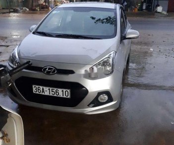 Hyundai Grand i10 2015 - Cần bán lại xe Hyundai Grand i10 2015, màu bạc, xe nhập chính chủ