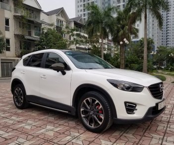 Mazda CX 5 2016 - Cần bán lại chiếc Mazda CX5 Signature Pre 2.5AT FWD, đời 2016, màu trắng, giá tốt