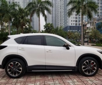 Mazda CX 5 2016 - Cần bán lại chiếc Mazda CX5 Signature Pre 2.5AT FWD, đời 2016, màu trắng, giá tốt