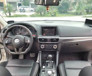 Mazda CX 5 2016 - Cần bán lại chiếc Mazda CX5 Signature Pre 2.5AT FWD, đời 2016, màu trắng, giá tốt