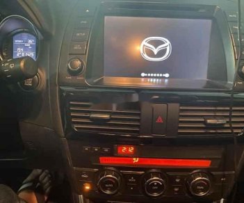 Mazda CX 5   2014 - Cần bán lại xe Mazda CX 5 năm sản xuất 2014, màu đen, 580 triệu