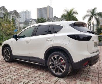 Mazda CX 5 2016 - Cần bán lại chiếc Mazda CX5 Signature Pre 2.5AT FWD, đời 2016, màu trắng, giá tốt