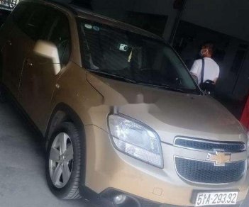 Chevrolet Orlando   2012 - Cần bán xe Chevrolet Orlando đời 2012, màu vàng, nhập khẩu 