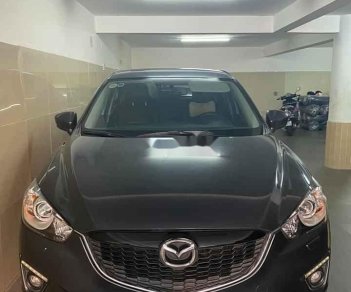 Mazda CX 5   2014 - Cần bán lại xe Mazda CX 5 năm sản xuất 2014, màu đen, 580 triệu