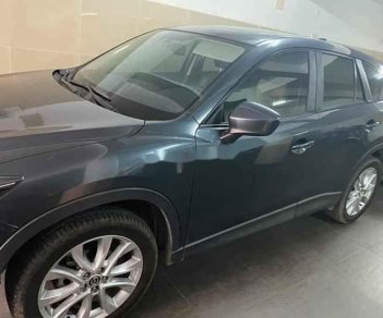 Mazda CX 5   2014 - Cần bán lại xe Mazda CX 5 năm sản xuất 2014, màu đen, 580 triệu