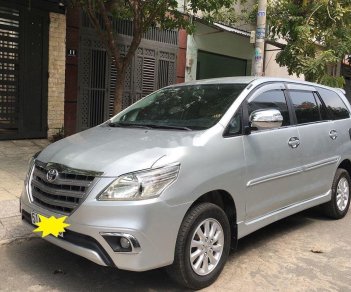 Toyota Innova 2014 - Bán Toyota Innova 2.0E MT năm sản xuất 2014, màu bạc còn mới, giá tốt