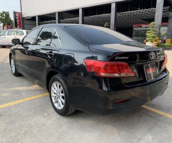 Toyota Camry 2010 - Bán xe Toyota Camry 2.4G sản xuất 2010, màu đen, số tự động