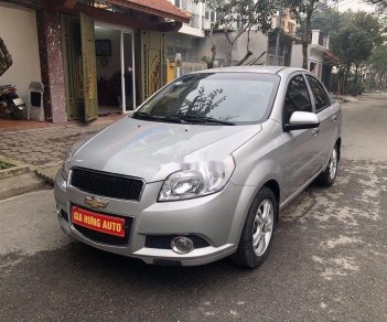 Chevrolet Aveo 2014 - Cần bán lại xe Chevrolet Aveo đời 2014, màu bạc chính chủ, 285tr