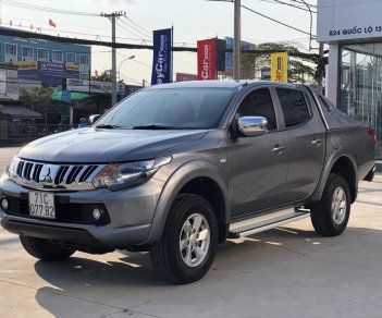 Mitsubishi Triton 2016 - Cần bán nhanh chiếc bán tải Mitsubishi Triton đời 2016, màu xám, giá cực kì thấp