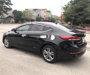 Hyundai Elantra   1.6AT   2017 - Bán Hyundai Elantra 1.6AT sản xuất 2017, màu đen còn mới, giá tốt