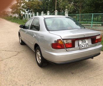 Mazda 323 1999 - Cần bán gấp Mazda 323 năm 1999, màu bạc, giá chỉ 85 triệu