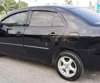 Toyota Vios 2009 - Cần bán xe Toyota Vios năm 2009, màu đen xe gia đình