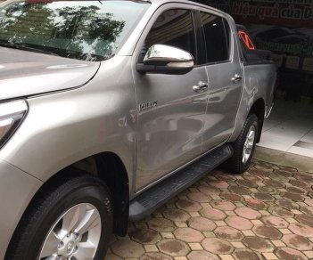 Toyota Hilux 2016 - Cần bán lại xe Toyota Hilux 3.0 AT sản xuất năm 2016, 590 triệu