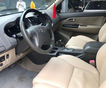 Toyota Fortuner 2012 - Cần bán gấp Toyota Fortuner V AT năm 2012, màu đen số tự động, giá chỉ 565 triệu