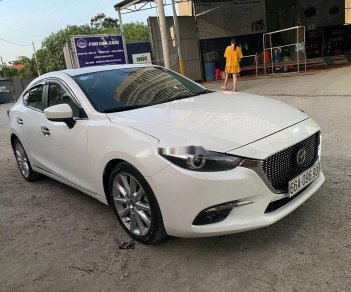 Mazda 3    2019 - Cần bán lại xe Mazda 3 đời 2019, màu trắng, 679tr