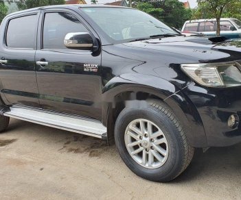 Toyota Hilux 2012 - Cần bán gấp Toyota Hilux 3.0 MT năm 2012, màu đen