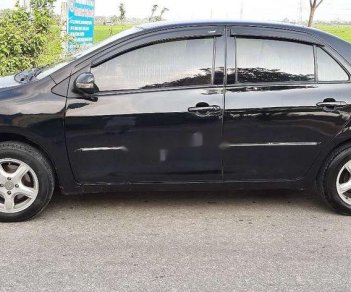 Toyota Vios 2009 - Cần bán xe Toyota Vios năm 2009, màu đen xe gia đình