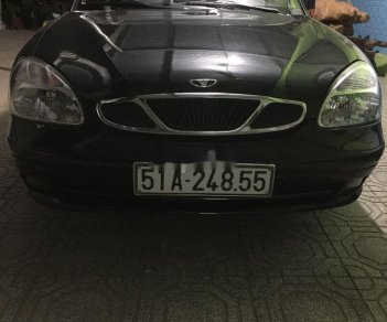 Daewoo Nubira 2003 - Cần bán Daewoo Nubira sản xuất 2003, màu đen xe gia đình