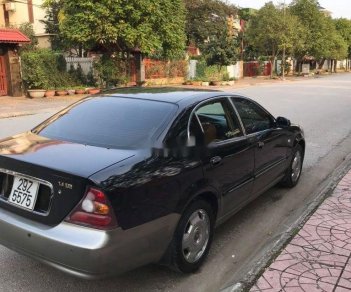 Daewoo Magnus 2007 - Bán xe Daewoo Magnus năm 2007, màu đen như mới, giá tốt