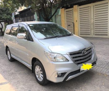 Toyota Innova 2014 - Bán Toyota Innova 2.0E MT năm sản xuất 2014, màu bạc còn mới, giá tốt