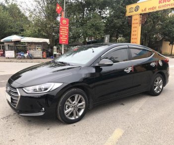 Hyundai Elantra   1.6AT   2017 - Bán Hyundai Elantra 1.6AT sản xuất 2017, màu đen còn mới, giá tốt