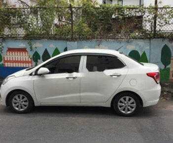 Hyundai Grand i10 2015 - Bán Hyundai Grand i10 năm sản xuất 2015, màu trắng, xe nhập