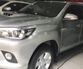 Toyota Hilux 2016 - Cần bán lại xe Toyota Hilux 3.0 AT sản xuất năm 2016, 590 triệu