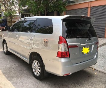 Toyota Innova 2014 - Bán Toyota Innova 2.0E MT năm sản xuất 2014, màu bạc còn mới, giá tốt