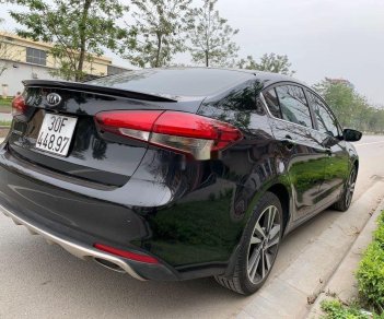 Kia Cerato 2018 - Cần bán Kia Cerato 1.6 AT sản xuất 2018, màu đen