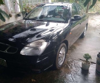 Daewoo Nubira  1.6MT  2002 - Bán Daewoo Nubira 1.6MT năm sản xuất 2002, màu đen, nhập khẩu nguyên chiếc, giá chỉ 60 triệu