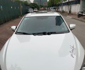 Mazda 3   2015 - Cần bán xe Mazda 3 đời 2015, màu trắng, nhập khẩu, giá tốt