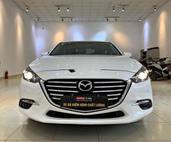 Mazda 3 2018 - Cần bán gấp Mazda 3 sản xuất năm 2018, màu trắng, 630 triệu