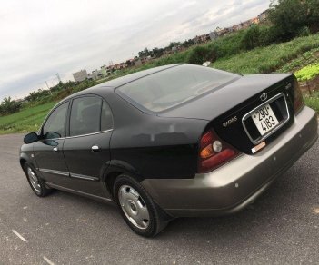 Daewoo Magnus 2004 - Cần bán xe Daewoo Magnus đời 2004, màu đen giá cạnh tranh