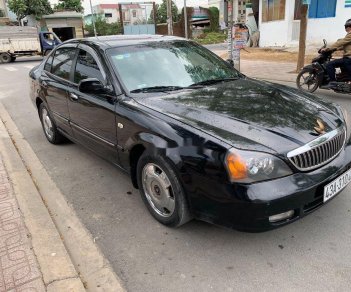 Daewoo Magnus 2004 - Cần bán Daewoo Magnus sản xuất 2004, màu đen, 139tr