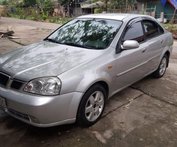 Daewoo Lacetti 2004 - Bán ô tô Daewoo Lacetti MT sản xuất 2004, màu bạc, xe nhập số sàn