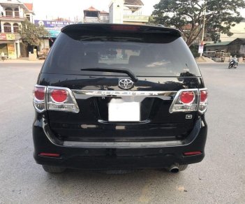 Toyota Fortuner 2014 - Bán ô tô Toyota Fortuner 2.5GMT năm sản xuất 2014, màu đen xe gia đình, giá tốt