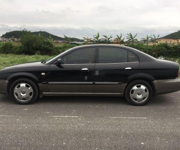 Daewoo Magnus 2004 - Cần bán xe Daewoo Magnus đời 2004, màu đen giá cạnh tranh