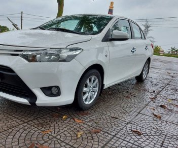 Toyota Vios 2014 - Gia đình cần bán Toyota Vios sản xuất 2014, màu trắng, mới đi được 10.000km