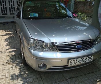 Ford Laser   2004 - Cần bán Ford Laser đời 2004, màu bạc, chính chủ