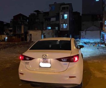 Mazda 3  1.5AT 2015 - Bán Mazda 3 1.5AT đời 2015, màu trắng xe gia đình