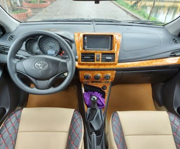 Toyota Vios 2014 - Gia đình cần bán Toyota Vios sản xuất 2014, màu trắng, mới đi được 10.000km