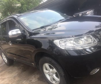 Hyundai Santa Fe 2008 - Gia đình cần bán nhanh chiếc Hyundai Santa Fe sản xuất 2008, màu đen, xe nhập, giá thấp