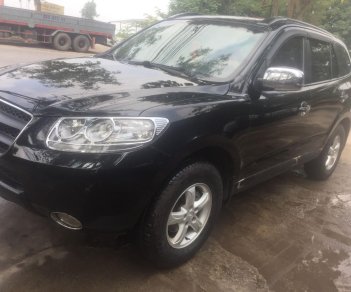 Hyundai Santa Fe 2008 - Gia đình cần bán nhanh chiếc Hyundai Santa Fe sản xuất 2008, màu đen, xe nhập, giá thấp